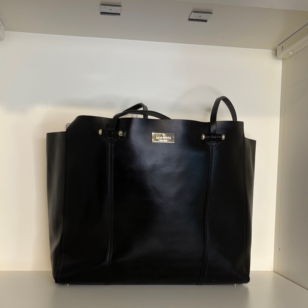 kate spade black leather tote with gold plaque